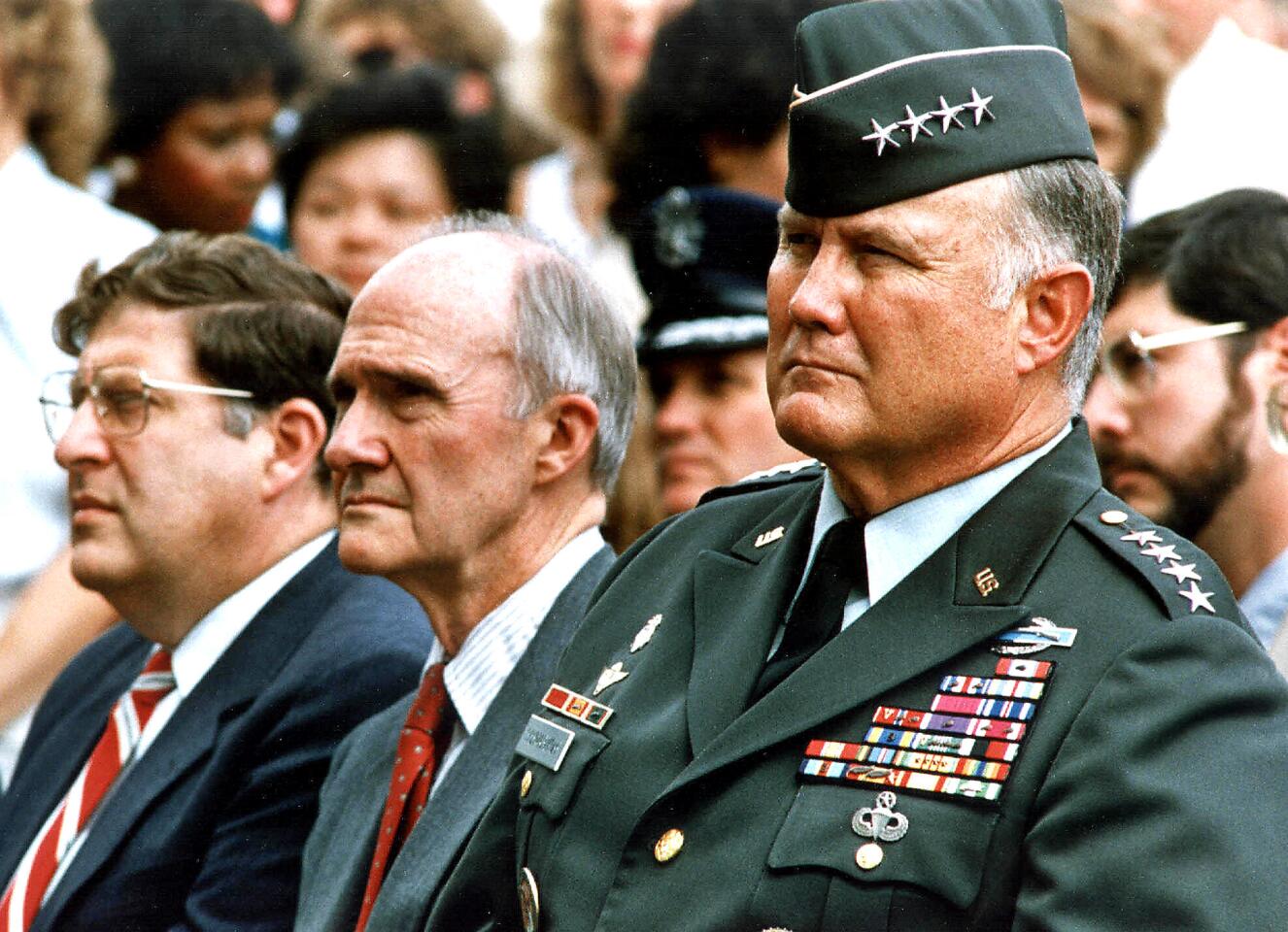 Gen. Norman Schwarzkopf, right, commander of Operation Desert Shield, sits next to National Security Advisor Brent Scowcroft, center, and White House Chief of Staff John Sununu at the Pentagon in 1990.