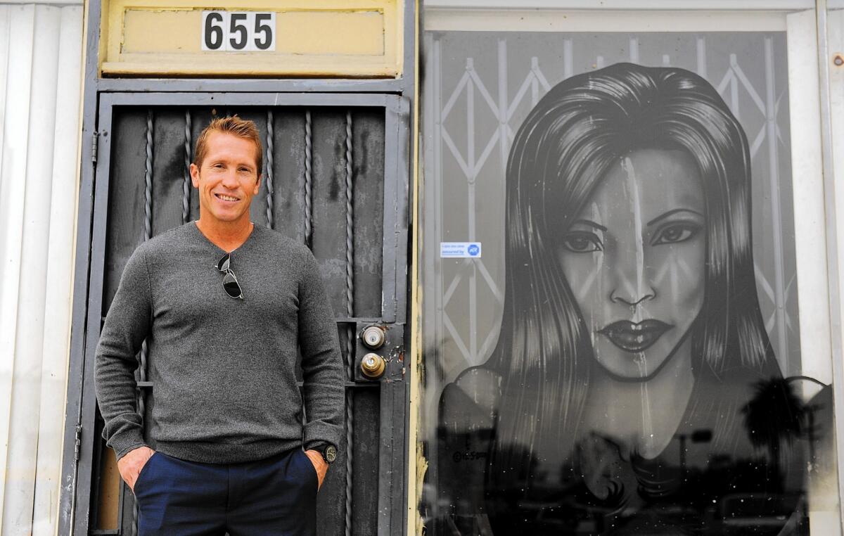 Matt Crabbs, a commercial real estate agent, says interest in properties around Inglewood has grown after the Rams announced they were headed to town. Above, Crabbs outside a building on La Brea Avenue.