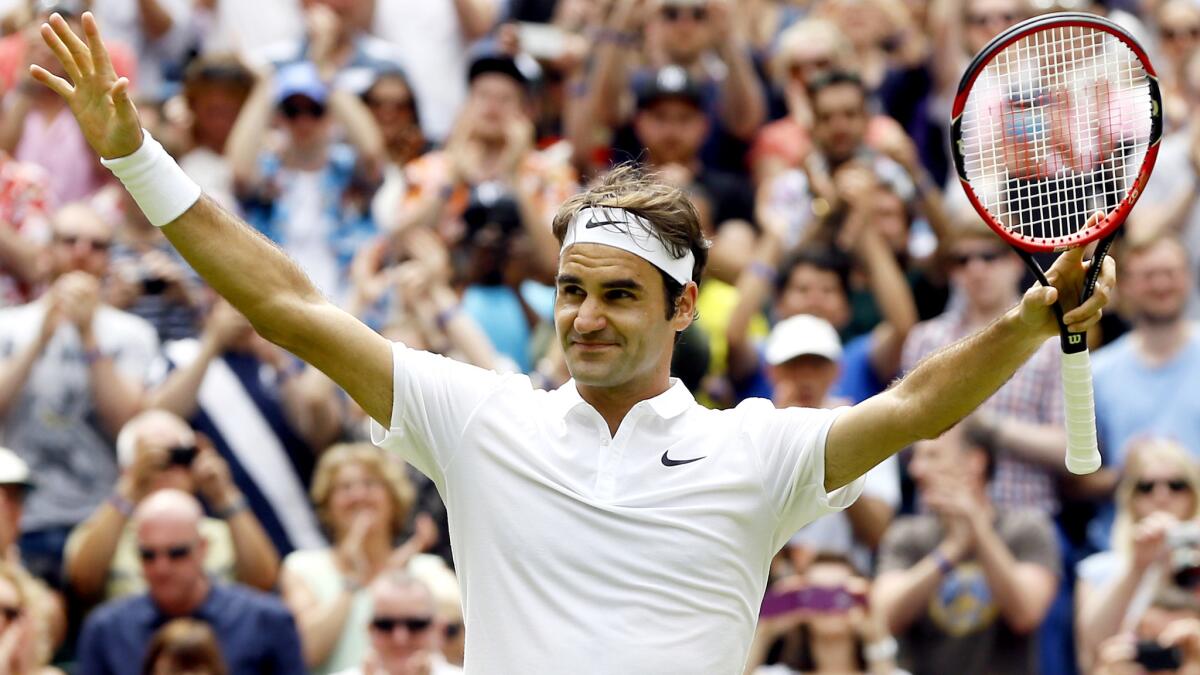 Roger Federer acknowledges the cheers after defeating Steve Johnson during a fourth-round match at Wimbledon on Monday.