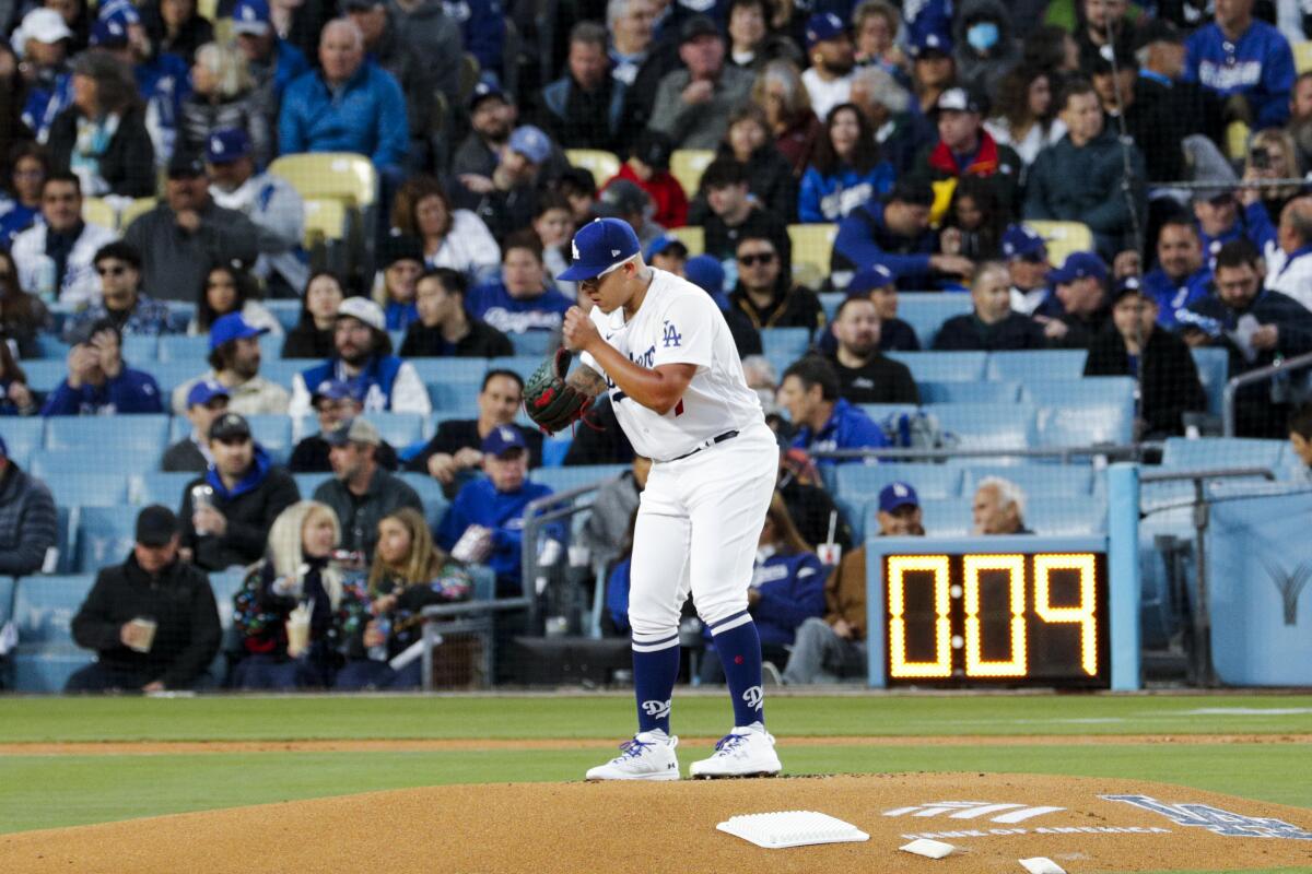 Dodgers starting pitcher Julio Urías prepares to throw during the first inning