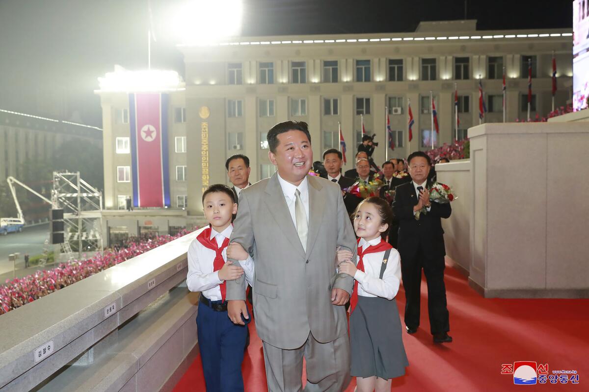 In this photo provided by the North Korean government, North Korean leader Kim Jong Un walks with children during a celebration of the nation’s 73rd anniversary at Kim Il Sung Square in Pyongyang, North Korea, early Thursday, Sept. 9, 2021. Independent journalists were not given access to cover the event depicted in this image distributed by the North Korean government. The content of this image is as provided and cannot be independently verified. Korean language watermark on image as provided by source reads: "KCNA" which is the abbreviation for Korean Central News Agency. (Korean Central News Agency/Korea News Service via AP)