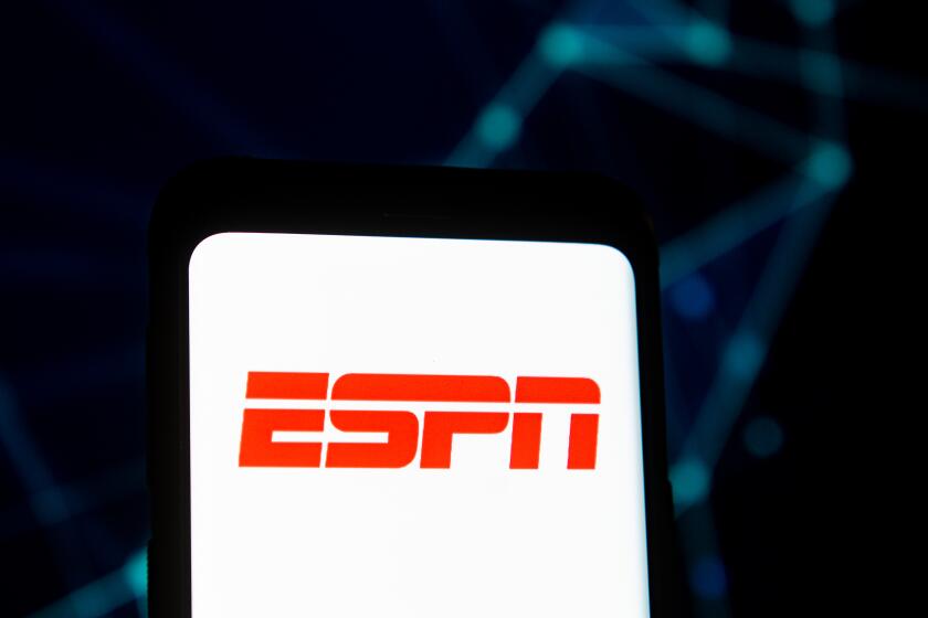 POLAND - 2020/03/23: In this photo illustration an ESPN logo seen displayed on a smartphone. (Photo Illustration by Mateusz Slodkowski/SOPA Images/LightRocket via Getty Images)