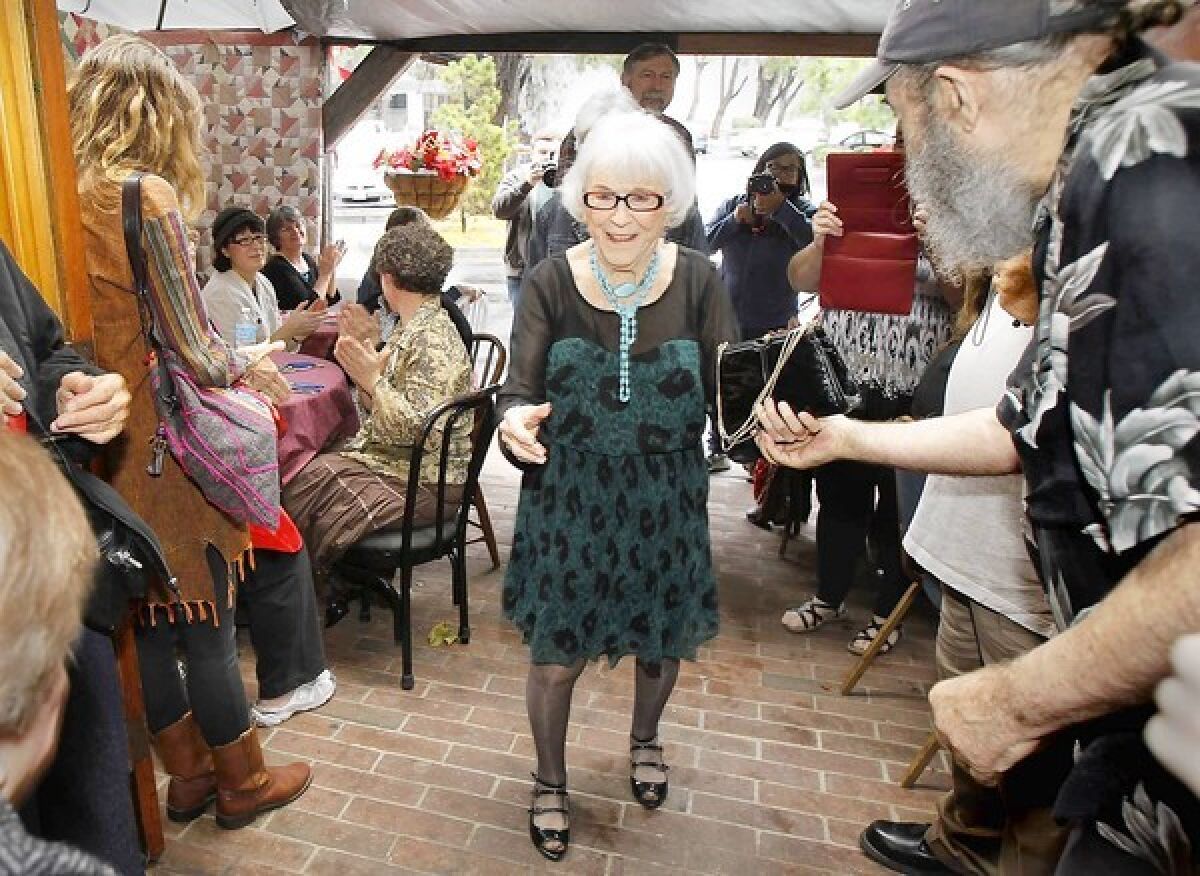 Viola Smith arrives at her 100th birthday party with a rousing ovation and live music in Costa Mesa on Thursday.
