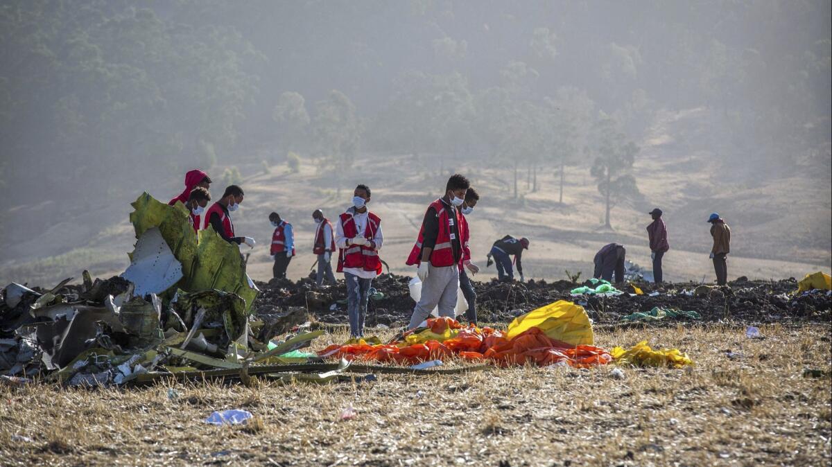 Rescuers work March 11 at the scene of an Ethiopian Airlines flight crash near Bishoftu, Ethiopia.