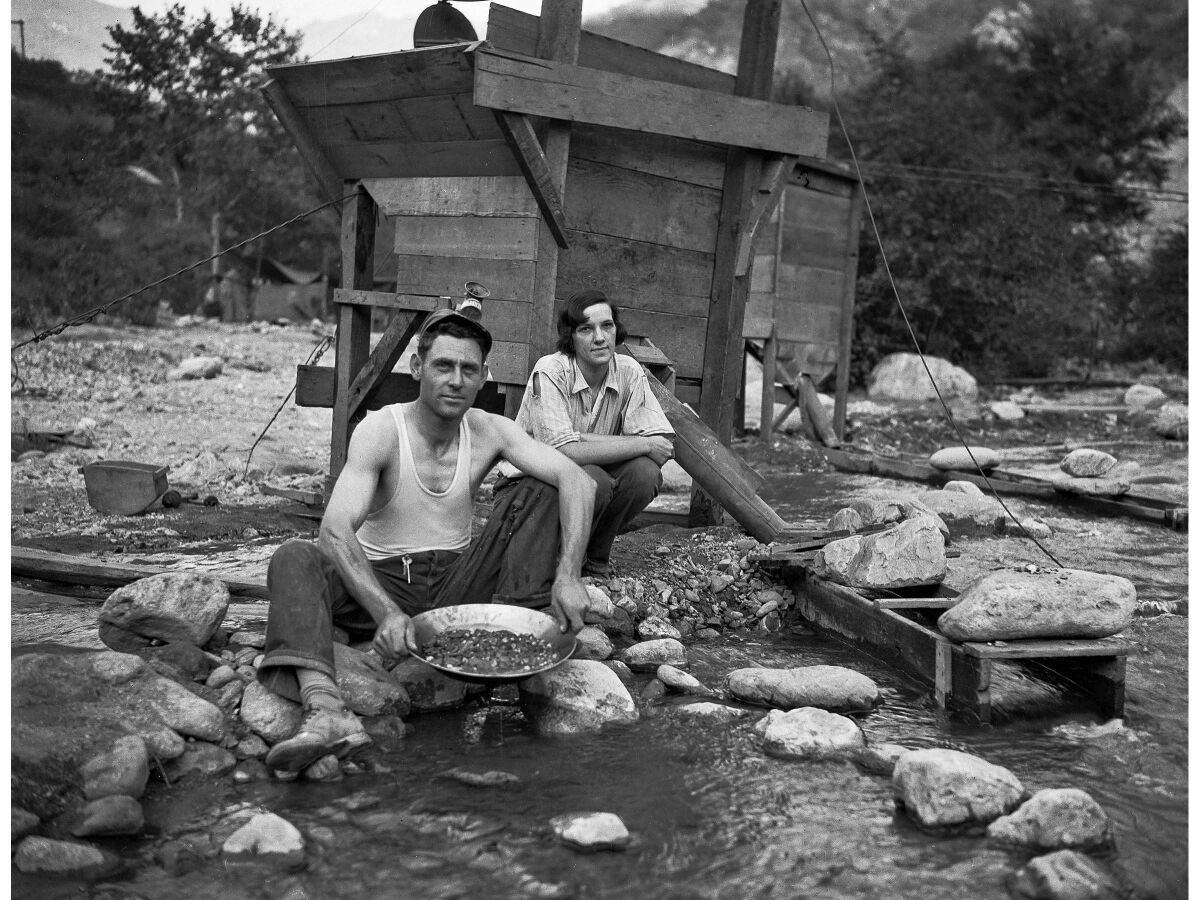 Mr. and Mrs. Frank Robison, recently of Oklahoma, looking for gold in San Gabriel Canyon in 1932.
