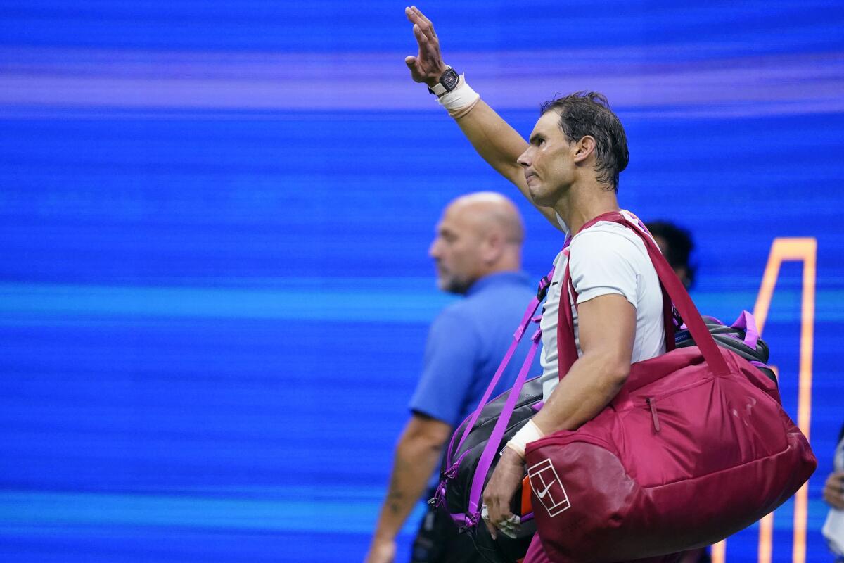 Rafael Nadal waves to fans after his loss to Frances Tiafoe on Monday.