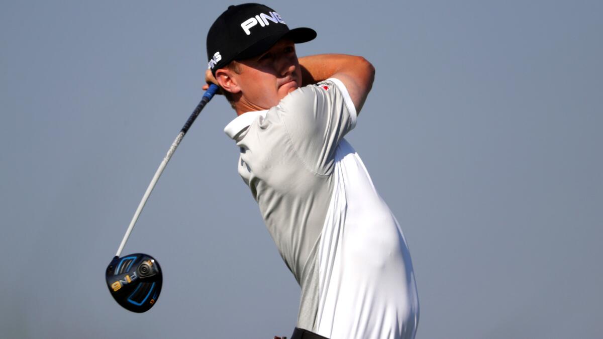 Mackenzie Hughes, shown hitting his tee shot at No. 15 on Thursday, had a bogey-free round Friday at the RSM Classic.