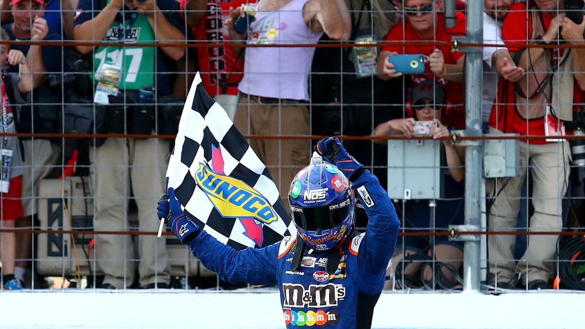 Kyle Busch celebrates after winning the Monster Energy NASCAR Cup Series ISM Connect 300 at New Hampshire Motor Speedway on Sunday.