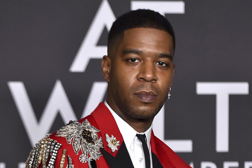 Kid Cudi arrives at the Celine Fall/Winter 2023 Fashion Show on Thursday, Dec. 8, 2022, at The Wiltern in Los Angeles. (Photo by Jordan Strauss/Invision/AP)