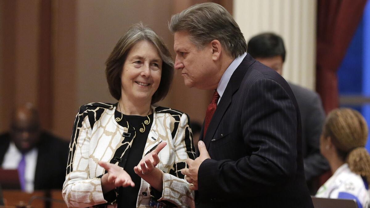 Democratic state Sens. Nancy Skinner of Berkeley and Bob Hertzberg of Van Nuys talk at the Capitol. Hertzberg's SB 10 ends money bail for suspects awaiting trial. Skinner's SB 1437 narrows the state's felony murder rule. Both bills were signed by Gov. Brown.