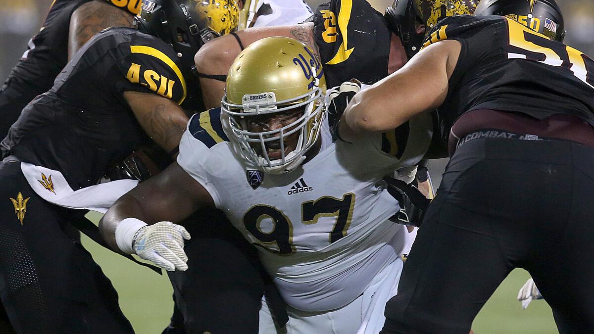 UCLA defensive lineman Kenny Clark tries to break through the Arizona State offensive line during the win over the Sun Devils.
