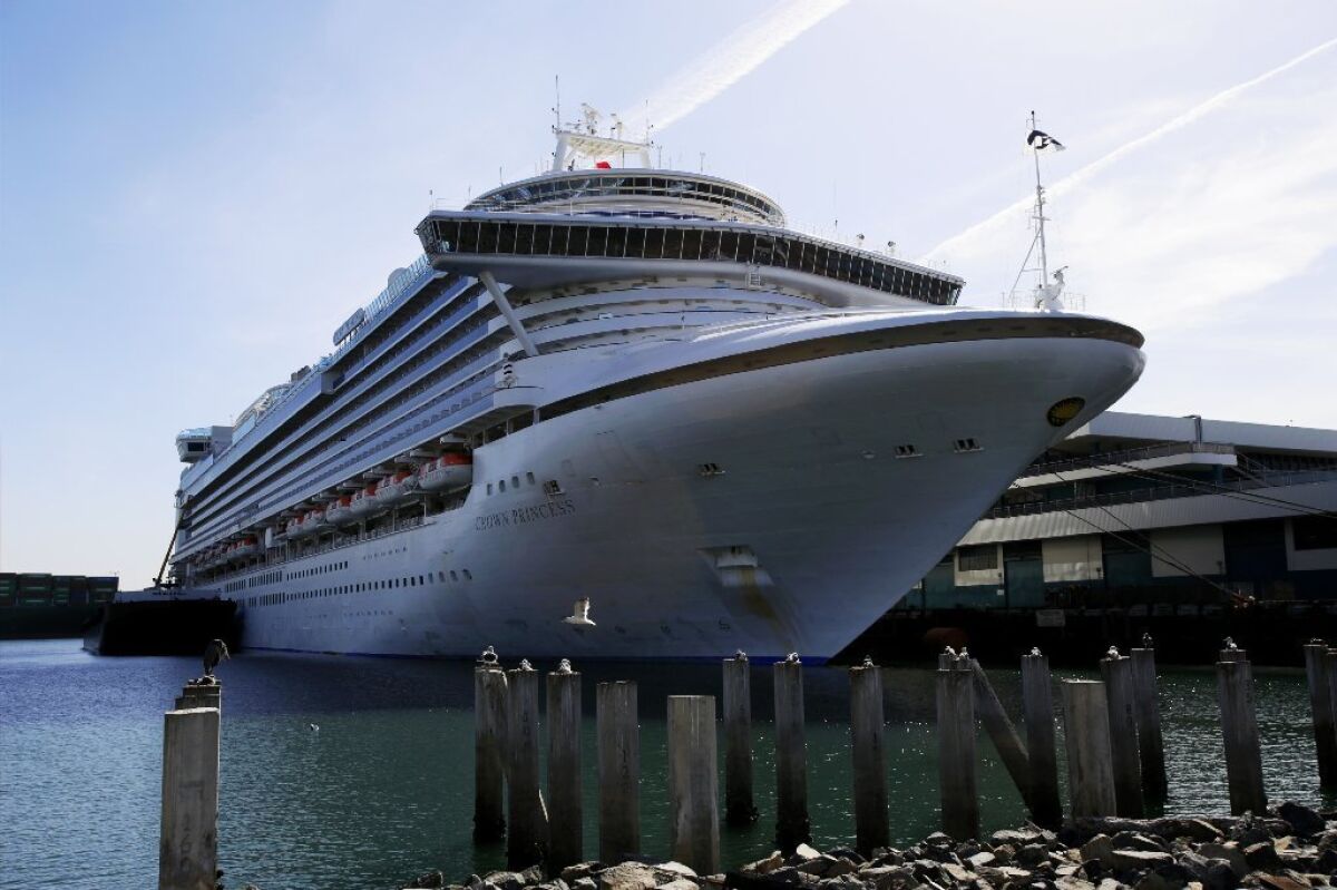 The Crown Princess cruise ship is docked in San Pedro on Sunday after crews were forced to cut short a voyage to Hawaii and Tahiti because of an outbreak on board of norovirus that sickened nearly 170 people.
