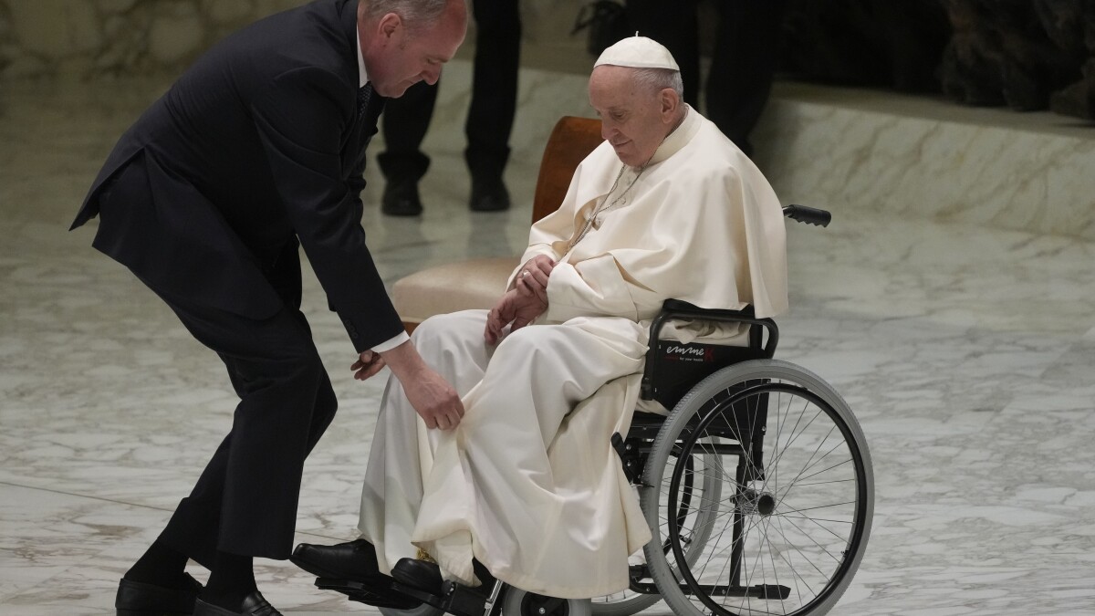 Papa en silla de ruedas
