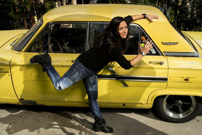 BEVERLY HILLS, CA-JANUARY 18, 2019: Pamela Adlon, star-writer-director-producer of the FX series ?Better Things,? is photographed outside her office in Beverly Hills. She is posing next to a 1964 Ford Fairlane that belongs to her hair stylist, Richard DeAlba. (Mel Melcon/Los Angeles Times)