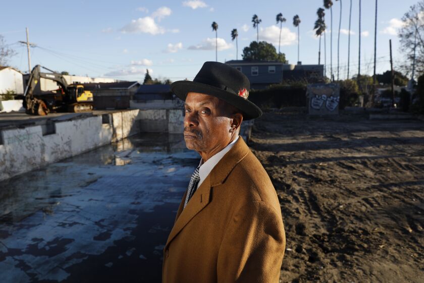 LOS ANGELES-CA-MARCH 1, 2023: Dr. W. Edward Jenkins, Pastor of Victory Baptist Church in Los Angeles, stands on the lot where his church once stood, on Wednesday, March 1, 2023. (Christina House / Los Angeles Times)