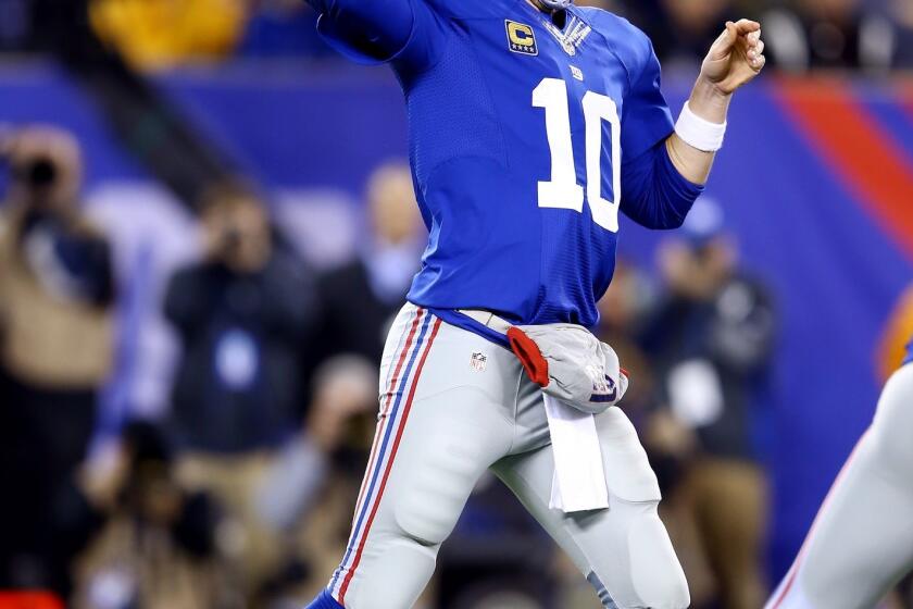New York quarterback Eli Manning makes a pass during the Giants' 23-7 win over the Minnesota Vikings on Monday night.