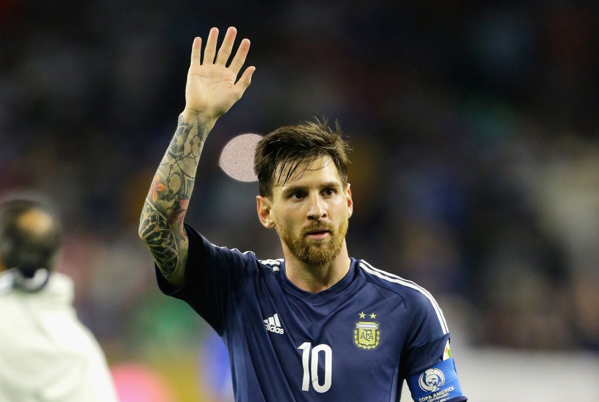 Argentina's Lionel Messi waves to the crowd after his team defeated the United States, 4-0, in a Copa America semifinal match.