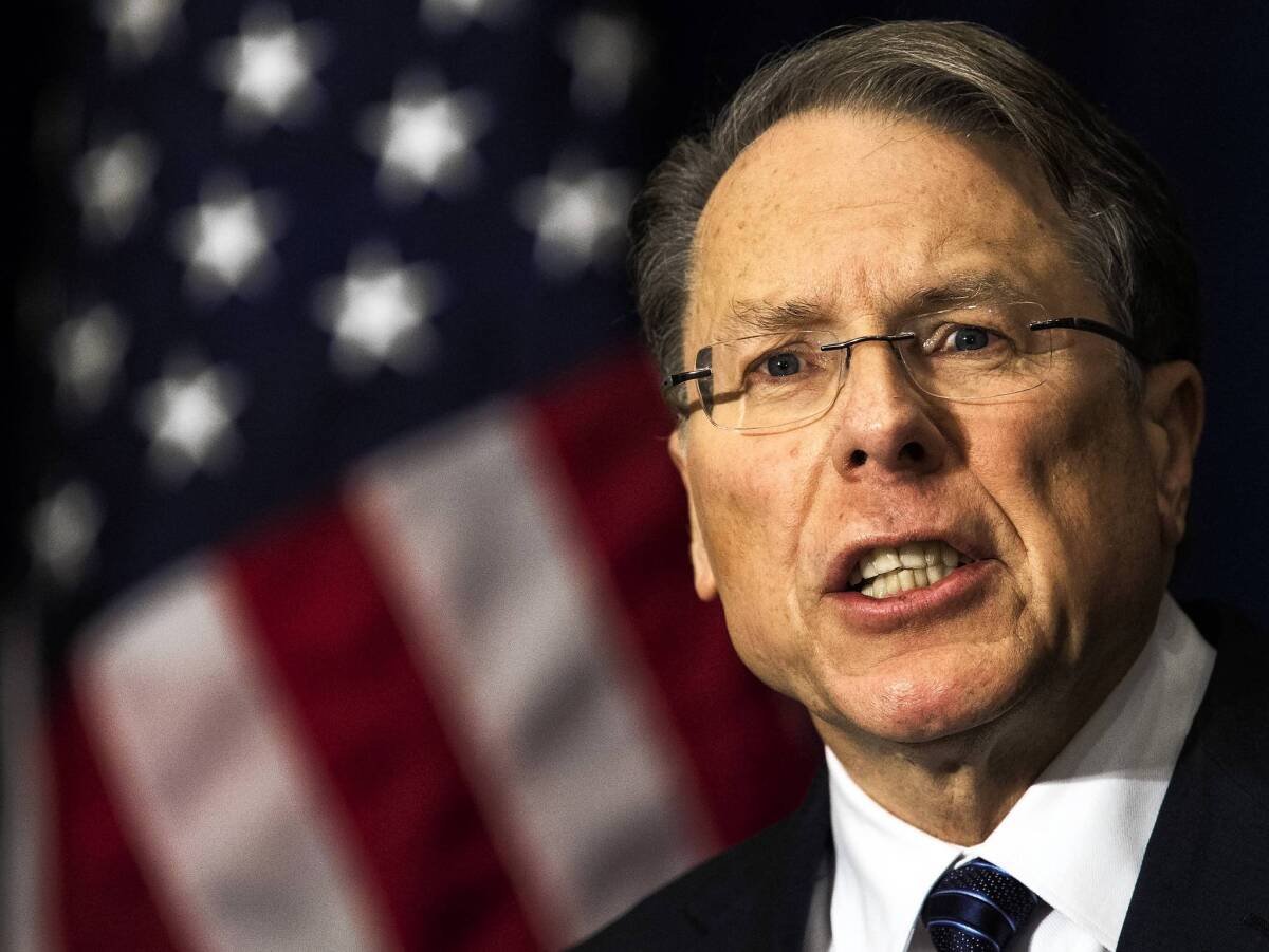 Wayne LaPierre of the NRA, speaking at a Washington news conference, lashes out at gun control activists and calls for armed guards in all the nation's schools to prevent gun violence.