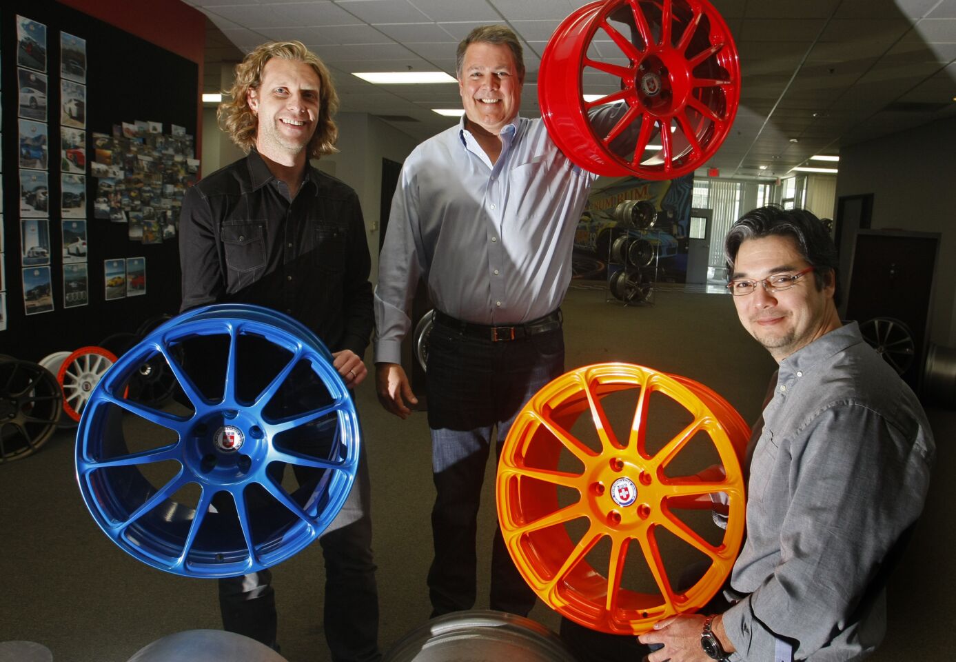 From left, Patrick Moran, creative director; Chris Luhnow, chairman and CEO; and Alan Peltier, president, in the headquarters of HRE Performance Wheels.