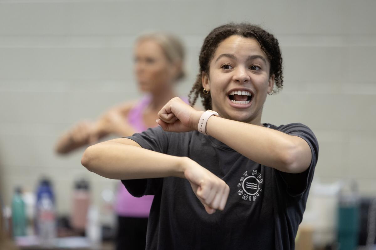 Newport Harbor's Alexandria Schachter helps lead a dance class for kids with developmental disabilities.