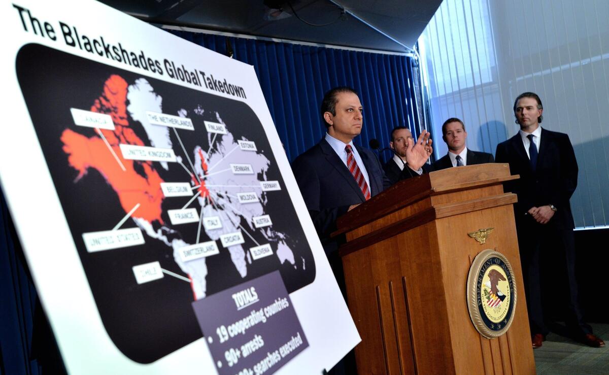 Preet Bharara, U.S. attorney for the Southern District of New York, and others at a news conference Monday.