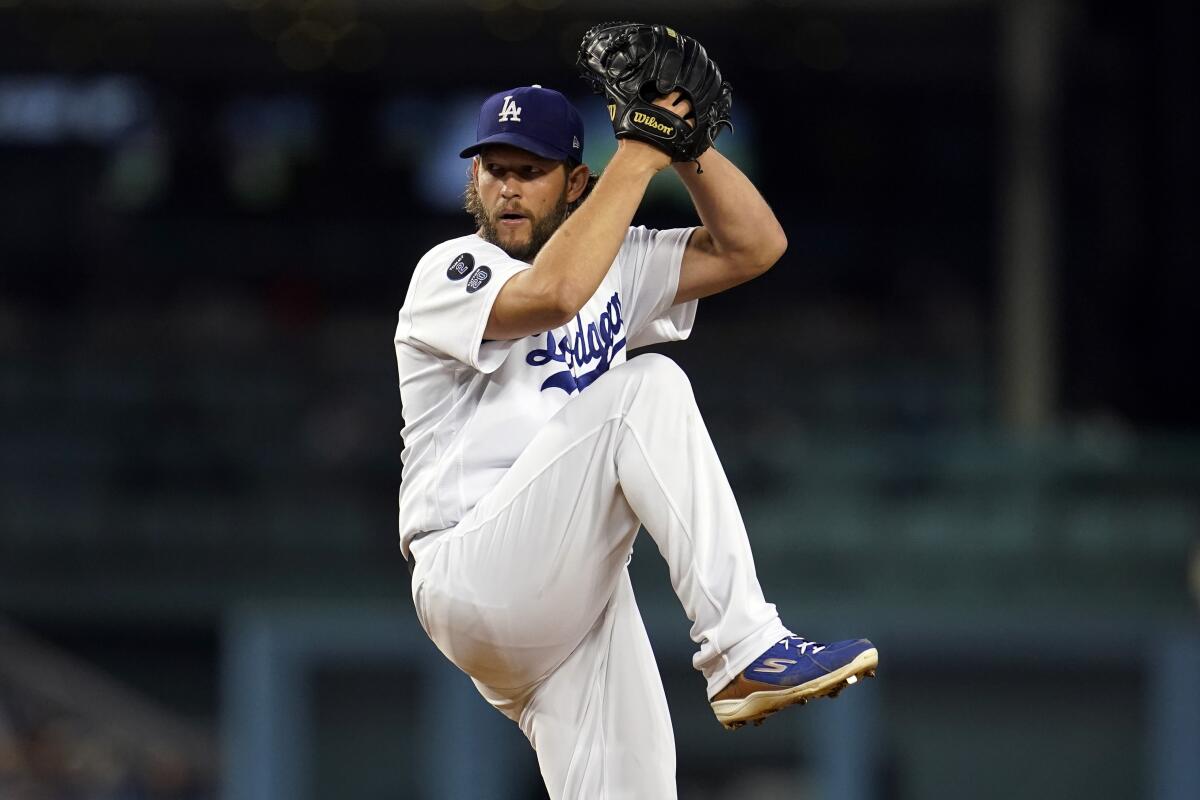 Los Angeles Dodgers starting pitcher Clayton Kershaw throws to an Arizona Diamondbacks batter during the first inning of a baseball game Monday, Sept. 13, 2021, in Los Angeles. (AP Photo/Marcio Jose Sanchez)