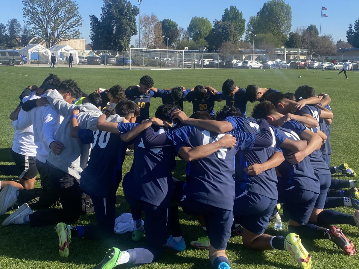 Birmingham soccer players gather before going on to defeat El Camino Real 3-1 behind two goals from David Diaz.