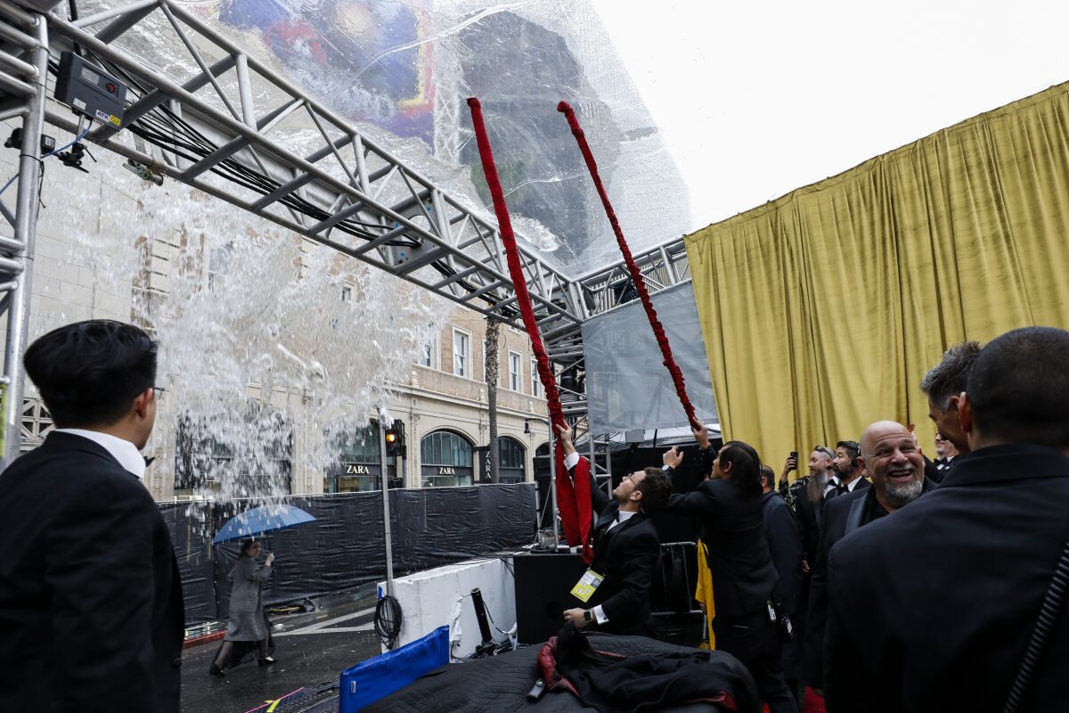 Rain pools above the red carpet at the 92nd Academy Awards.