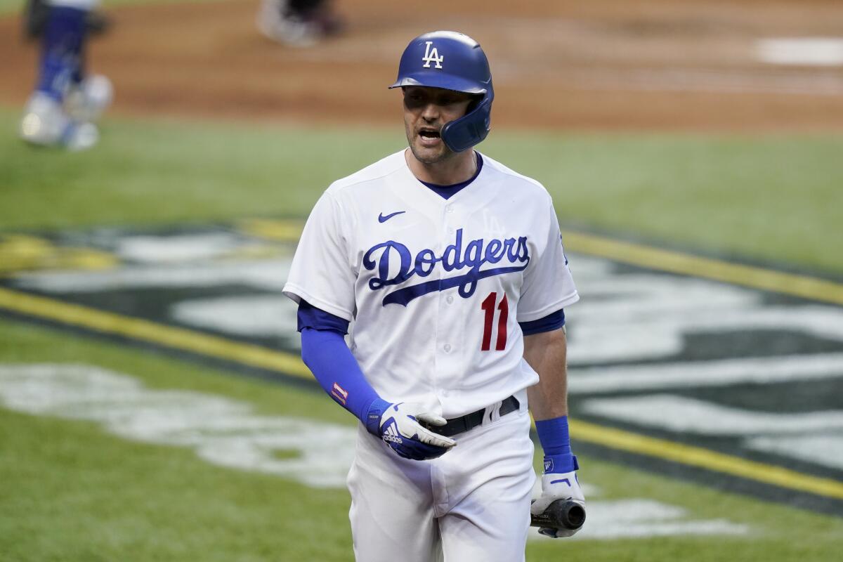 Dodgers' AJ Pollock reacts after striking out during the fourth inning against the Atlanta Braves on Tuesday.