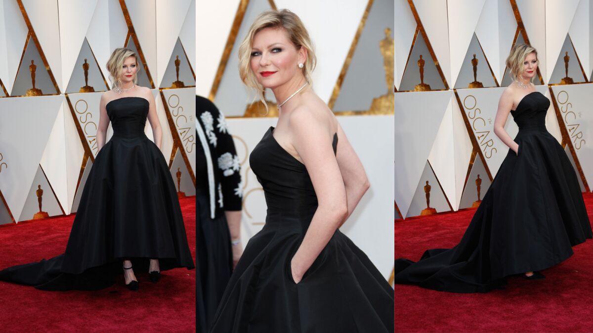 Kirsten Dunst is wearing a custom Christian Dior Haute Couture dress (extra points for the pockets!), Niwaka diamond necklace and earrings, and Christian Lacriox shoes. She's also carrying a Roger Vivier clutch -- all the way to our best-dressed list.