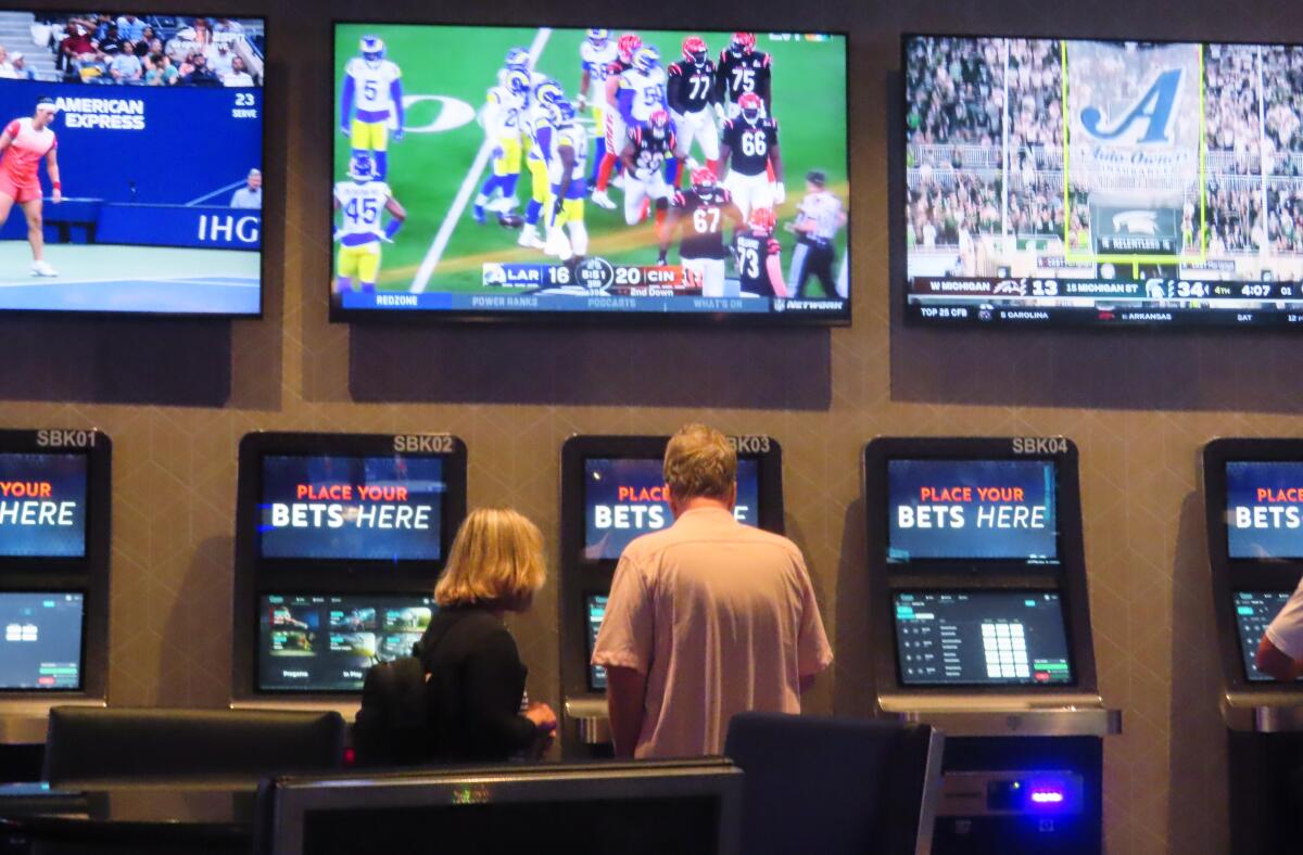 A customer makes a sports bet at the Ocean Casino Resort in Atlantic City, N.J., on Sept. 6, 2022.