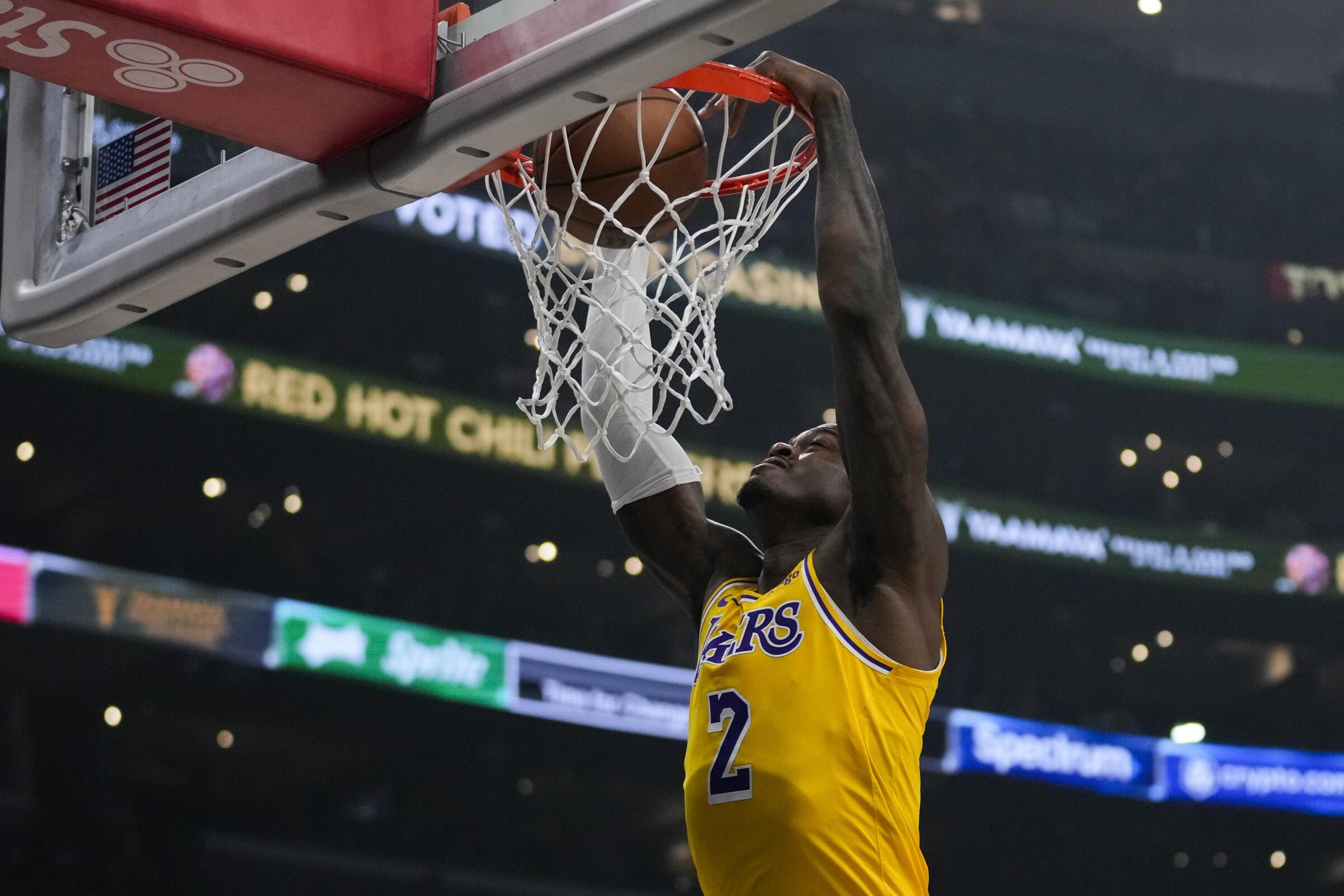 Lakers forward Jarred Vanderbilt dunks during the first half of Tuesday's game against the Clippers at Crypto.com Arena.