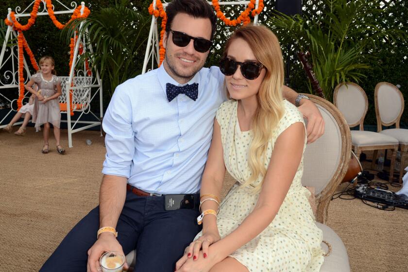 Lauren Conrad and William Tell, shown in a file photo, got married Saturday.