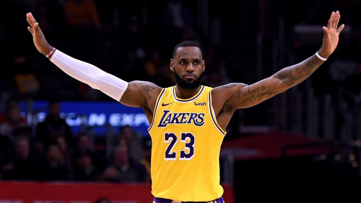 Lakers star LeBron James celebrates a defensive stop against the Clippers on Jan. 31.
