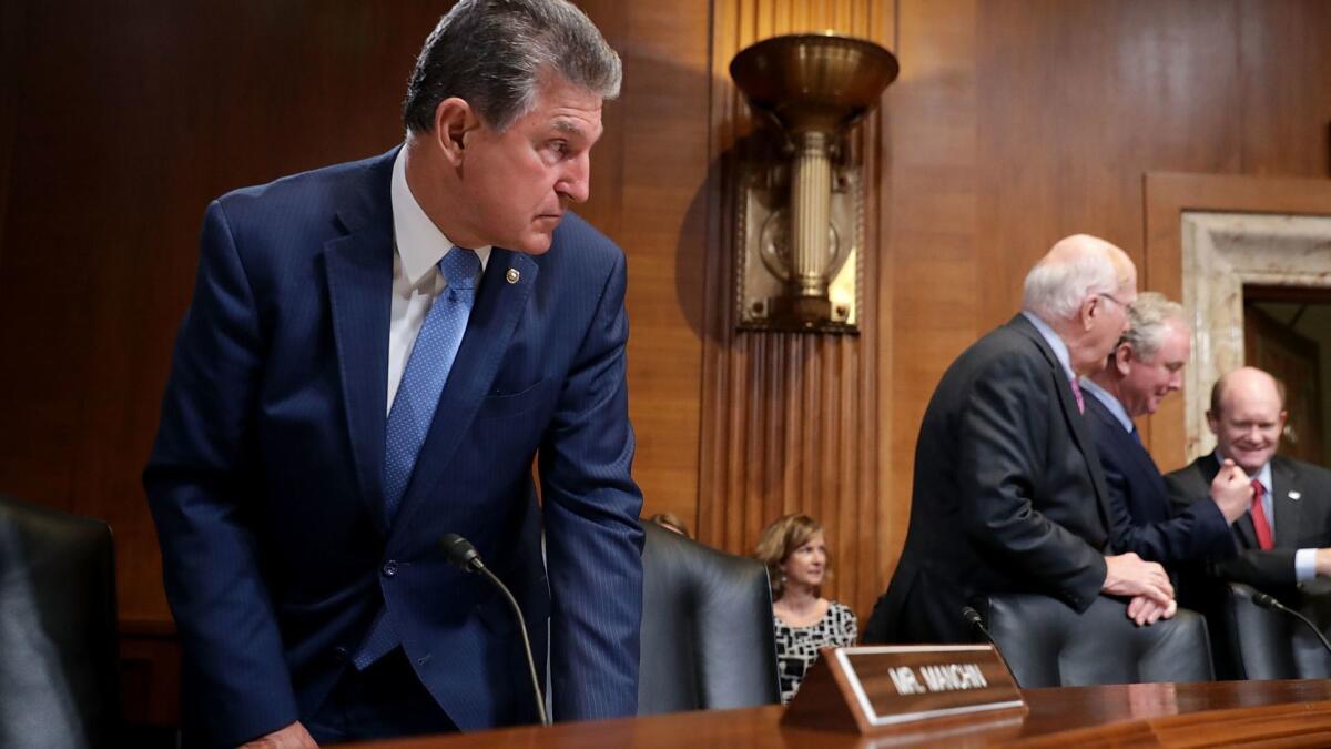 Sen. Joe Manchin III (D-W.Va.), shown in May on Capitol Hill, has spent the last 18 months trying to make amends with his electorate after endorsing Hillary Clinton.