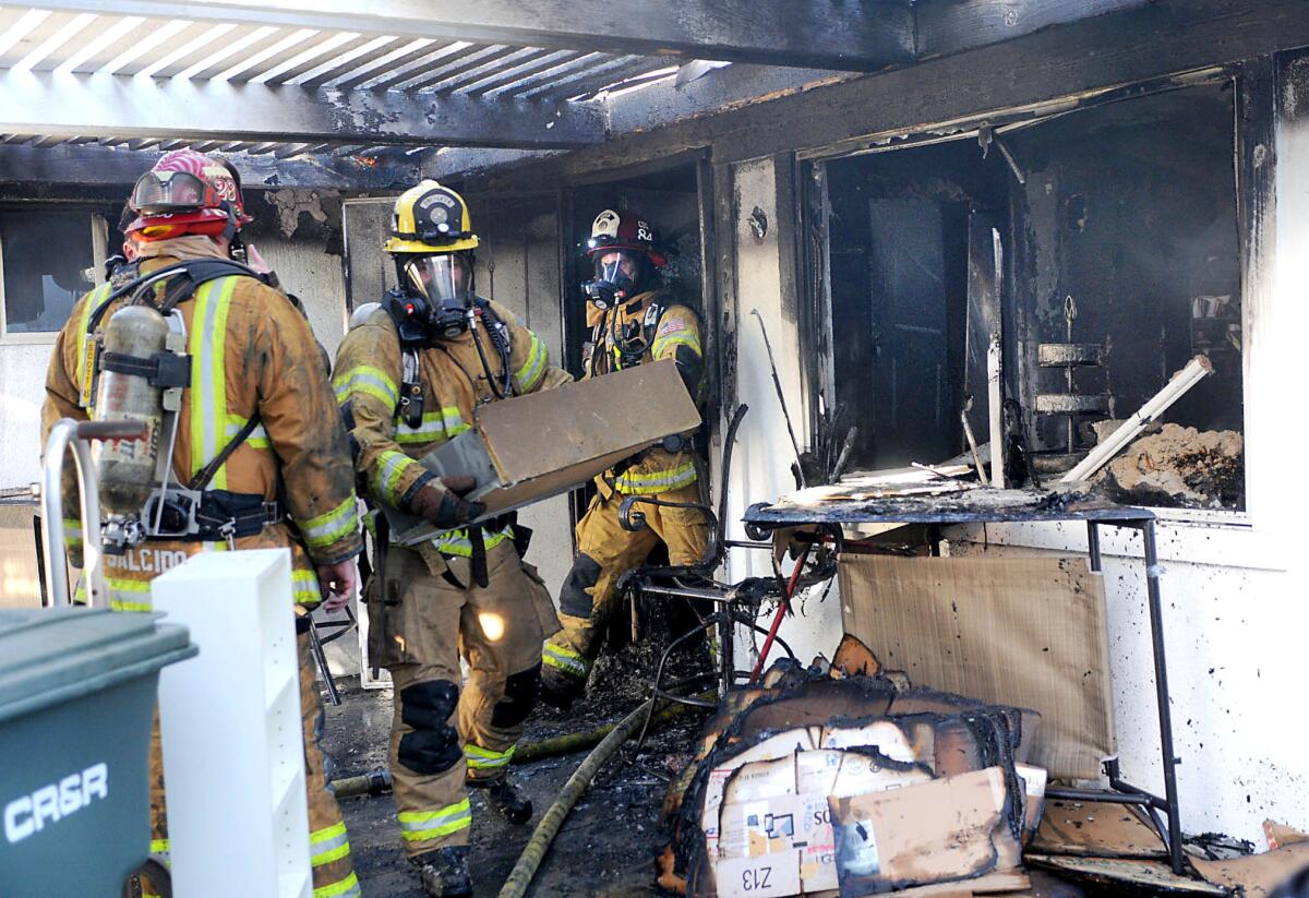 Twenty-six firefighters from Newort Beach,Costa Mesa and Orange County Fire Authority battled a 2-alarm fire Wednesday morning inide a single-story home in the 2600 block of Willow Lane in Costa Mesa.