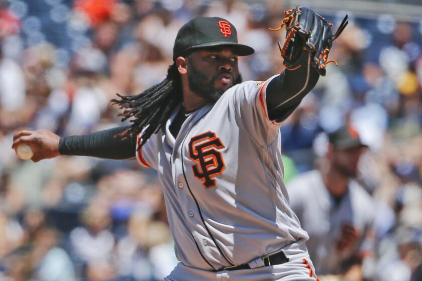 San Francisco's Johnny Cueto began the second half of the season leading the National League in wins (13) and complete games (four), with a 2.47 ERA.