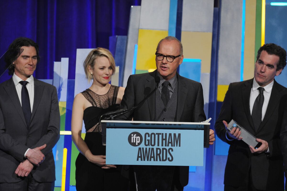 From left, Billy Crudup, Rachel McAdams, Michael Keaton and Brian d'Arcy James accept the best feature award for "Spolight."