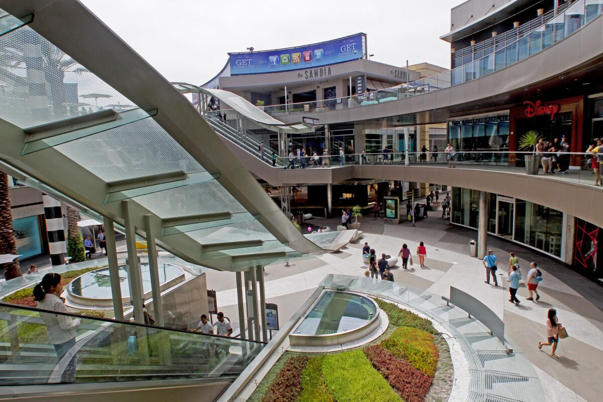 The remodeled Santa Monica Place sits across the street from the historic Sears store in Santa Monica.