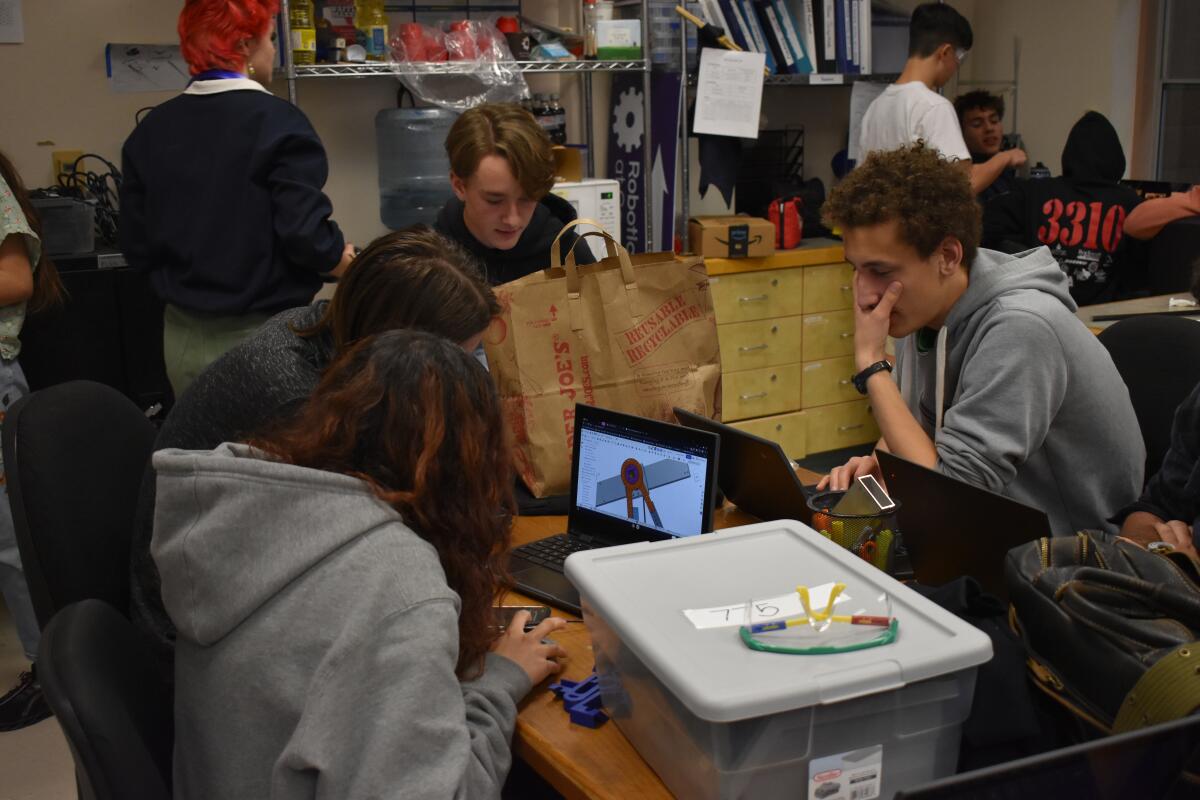 The Mechanical Department CADing during their week 5 of Build Season.
