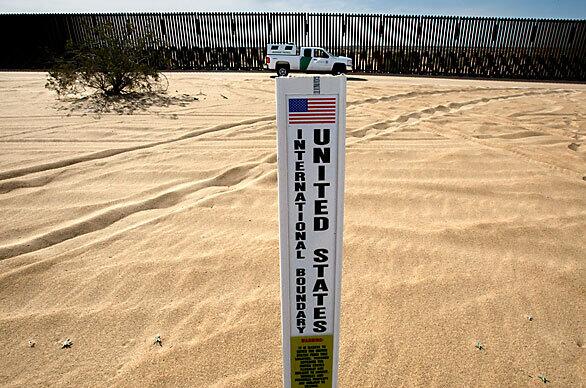 A sign remains in place where it once warned off-roaders of the boundary location in the Imperial Sand Dunes of southeastern California. More recently, there's a 15-foot-high fence to deter illegal immigrants. But arrests at the U.S.-Mexico border have fallen to levels unseen since the 1970s.