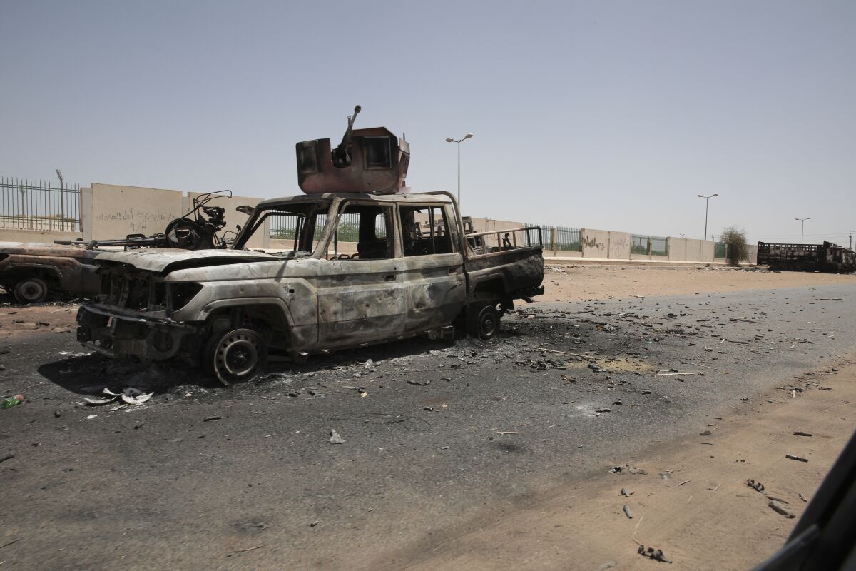 A blackened car in Khartoum, Sudan.