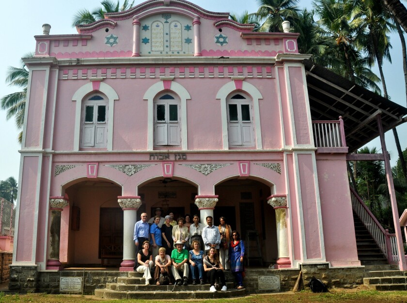 Travelers pose at the Magen Aboth Synagogue in Alibag on India's Konkan Coast, a stop on Burkat Global's 3000 Years of Jewish India tour.