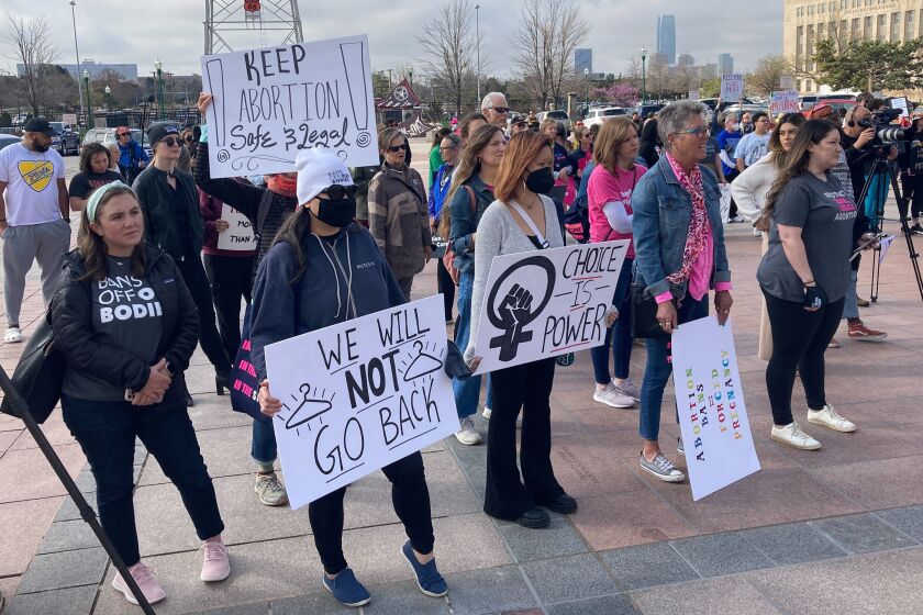 Abortion rights advocates gather outside the Oklahoma Capitol on Tuesday, April 5, 2022, in Oklahoma City, to protest several anti-abortion bills being considered by the GOP-led Legislature. (AP Photo/Sean Murphy)