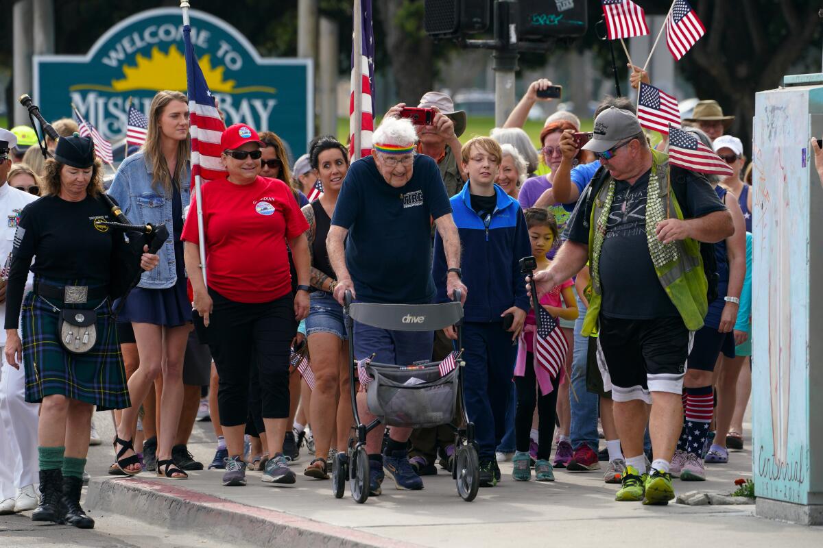  U.S. Navy veteran Ernie Andrus completes the final leg of his trek across the country on his 100th birthday. 