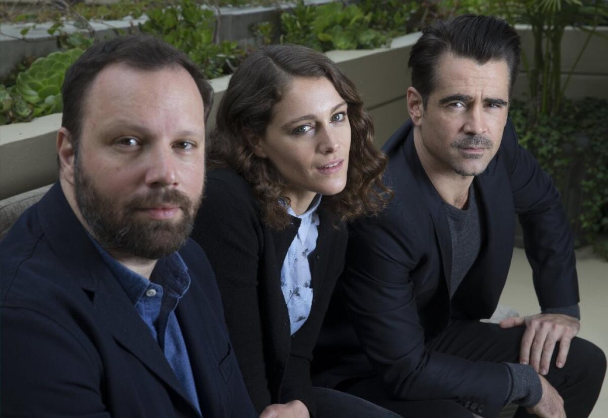 Actors Colin Farrell, right, and Ariane Labed worked with filmmaker Yorgos Lanthimos, left, on "The Lobster," a surreal romance in which single people must find a mate or be turned into an animal.