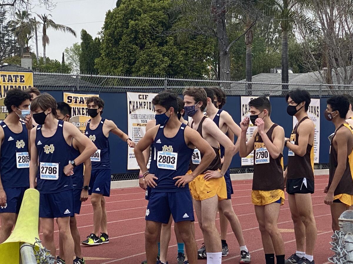 Runners prepare to race on a makeshift course.