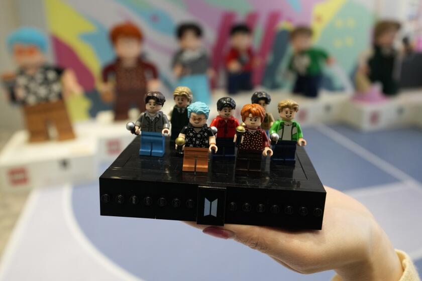 FILE - A LEGO set made of its blocks featuring K-pop band BTS, is shown during a publicity event at a store in Seoul, South Korea, on March 2, 2023. Danish toymaker Lego said Monday Sept. 25, 2023 that an experiment to make its colorful building bricks out of recycled drinks bottles didn’t work but the world’s largest toymaker “remains committed” to its plans to find sustainable materials to reduce carbon emission. (AP Photo/Lee Jin-man, File)