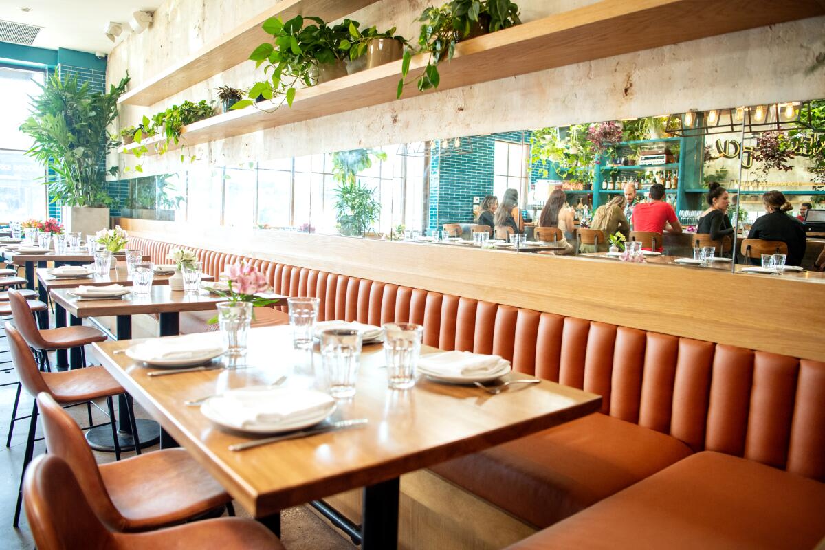 A long booth in the Nic's on Beverly dining room