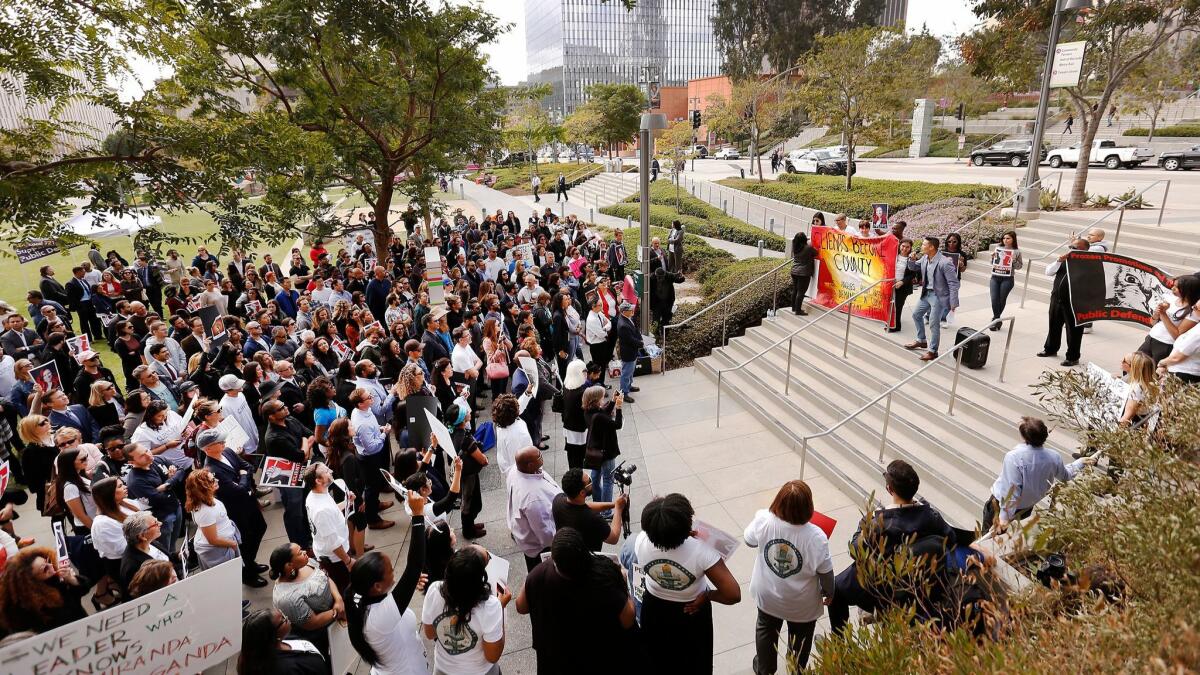 A crowd of L.A. County deputy public defenders and supporters gathered Monday for a rally in opposition of their new boss.